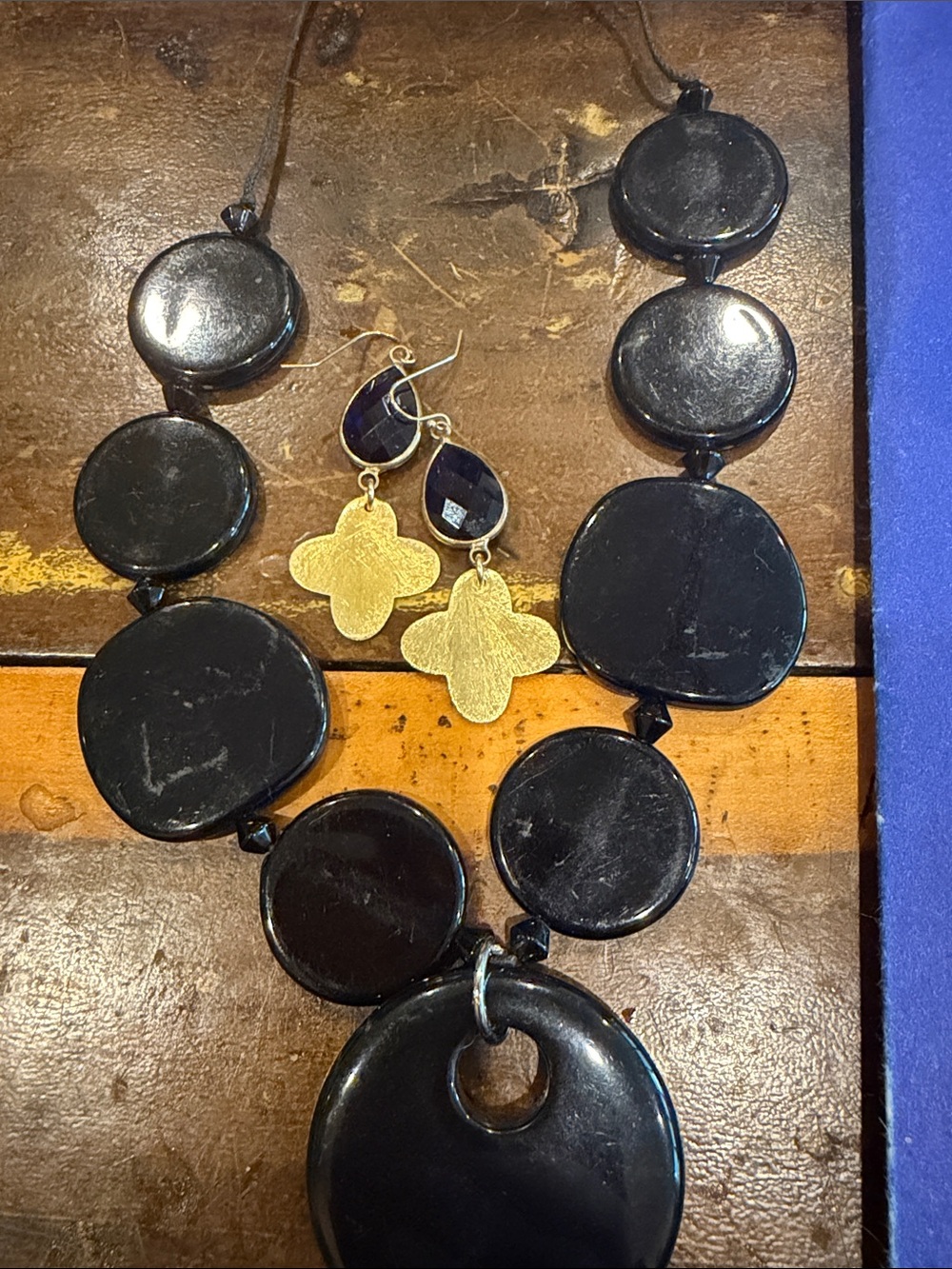 Black Statement Disc Necklace with Gold Clover Earrings